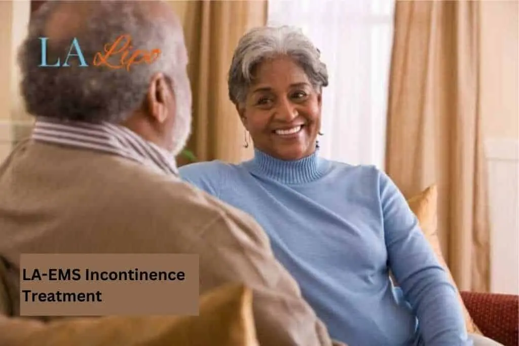Couple sat smiling at each other - LA-EMS treatment Greater London (Bexley)