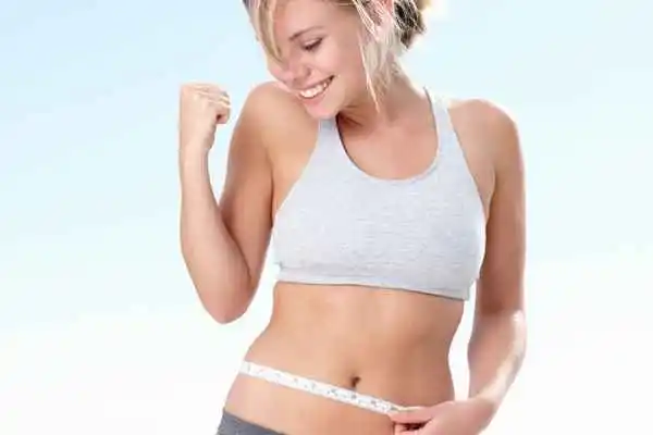 woman happy after fat reduction treatment Greater London (Bexley)