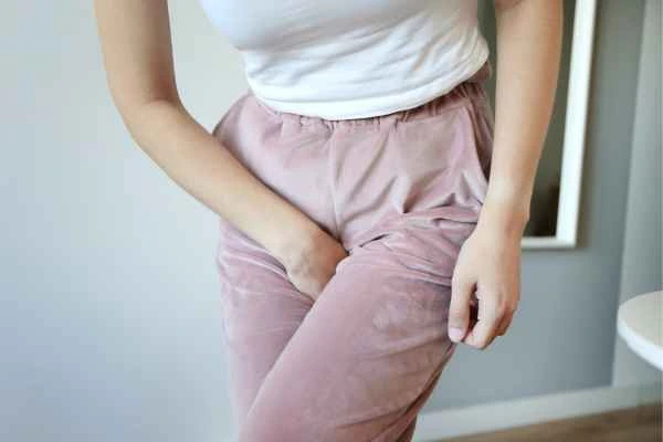 older woman running to the toilet because of urinary incontinence Greater London (Bexley)
